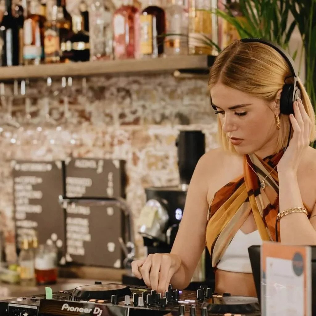 DJ playing at an event in the Paint Nails London salon bar