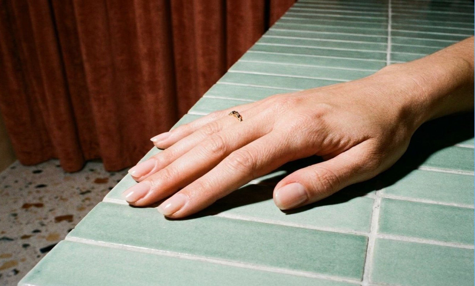 Natural nude manicure on medium almond nails, from London's leading nail salon